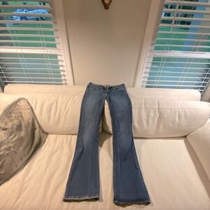 Size 31 PAIGE jeans. Flared bottoms. Only worn once!